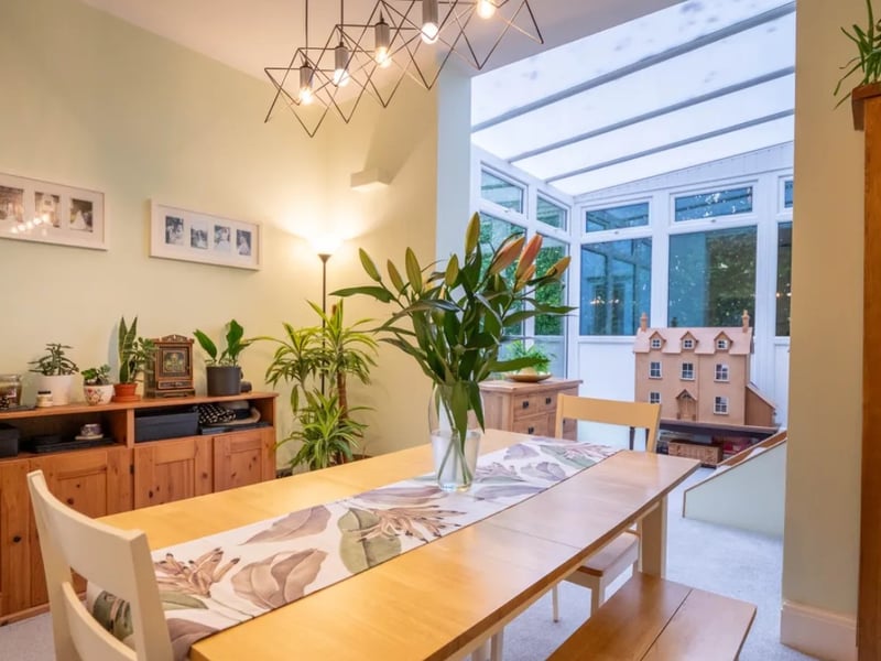 The listing says: "We are delighted to offer an opportunity to purchase this unique, detached family home situated in the peaceful, elevated location of Down End, Drayton with views over Langstone Harbour and Hayling Island."