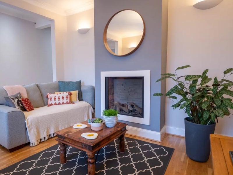 This home comes with four bedrooms, two bathrooms and three reception rooms.