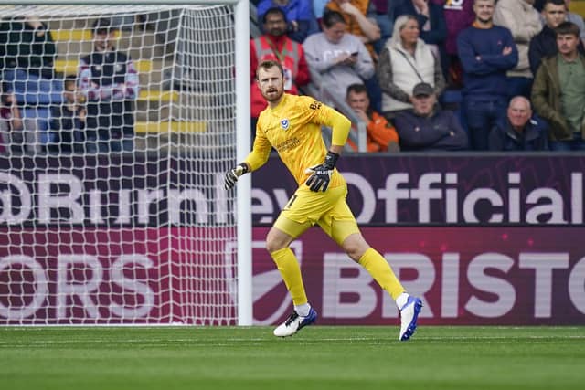The keeper hasn't featured since the 6-1 loss to Stoke, with Nicolas Schmid playing the past two games. John Mousinho revealed on Saturday that the stopper tweaked his medial collateral ligament and is unlikely to be available until the trip to Hull on November 2.