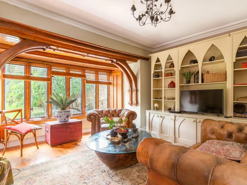 This home comes with six bedrooms, four bathrooms and five reception rooms.