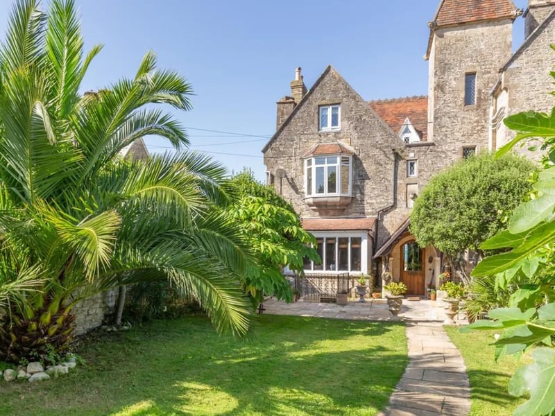 The listing says: "Occupying a prime waterfront and sought after location this attractive period house offers plenty of accommodation, private gardens and a new garage annexe or home office."