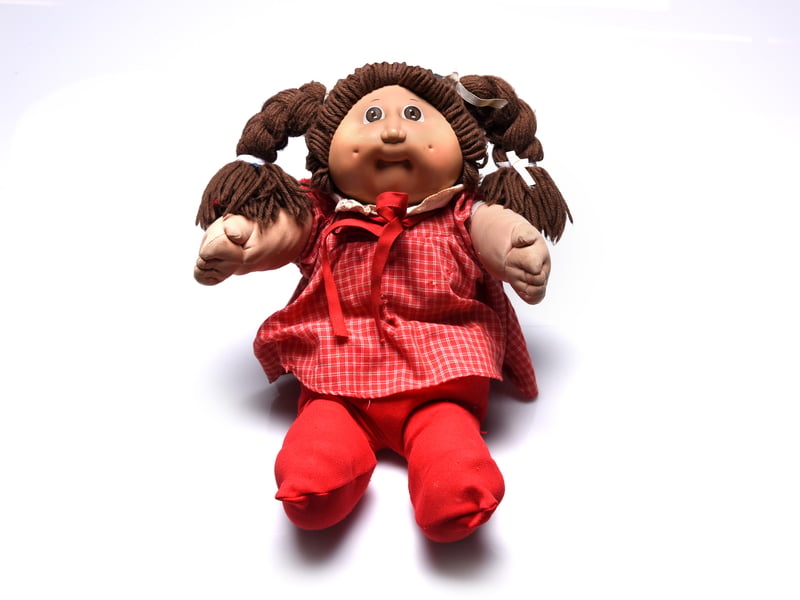 If you grew up in the 1980s - or had kids at that time - you will definitely remember Cabbage Patch Dolls. While they were popular for a long time, it was the Christmas of 1983 when things got really crazy - especially over the pond in the US. Footage from the time shows huge queues and chaos in stores as shoppers tried to get their hands on them.