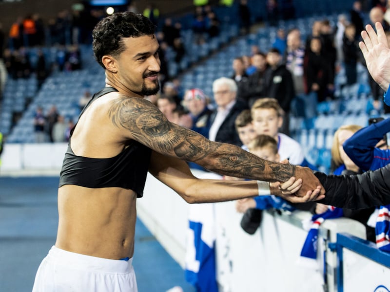 Rangers left-back Jefte meets fans after the game.