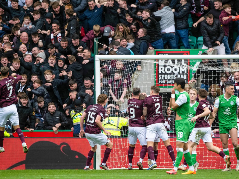 Hearts fans go wild as James Wilson celebrates his dramatic late leveller.