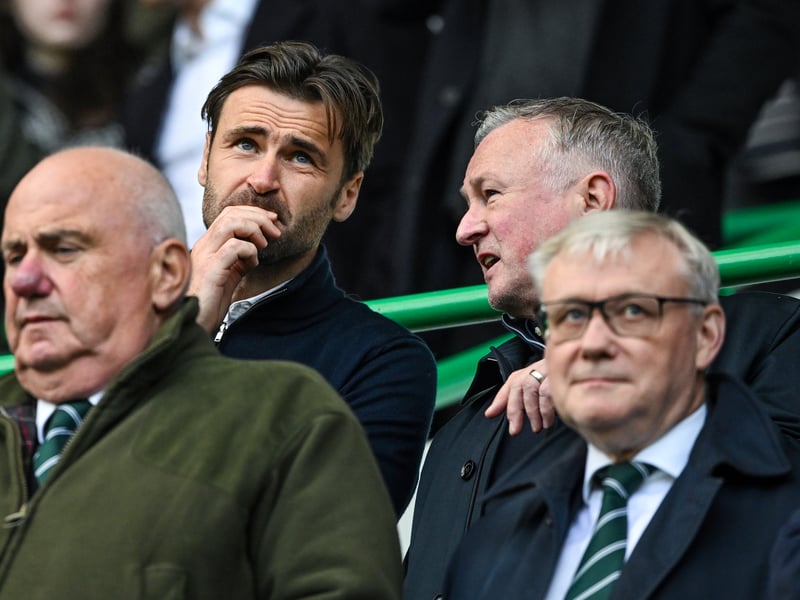 Hibs technical performance manager David Marshall (L) and Northern Ireland manager Michael O'Neill take in the pre-game atmosphere.