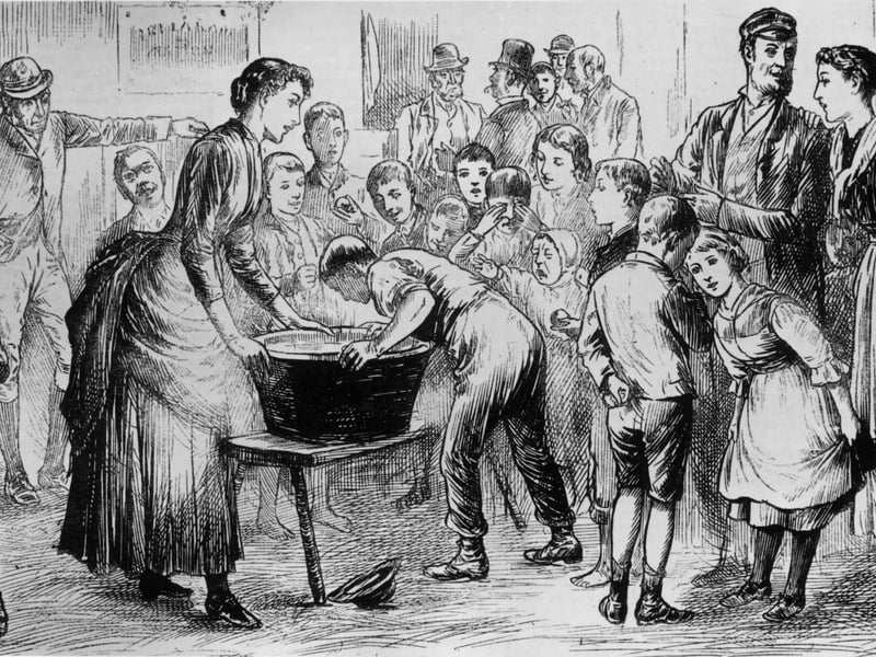 In Scotland, dooking for apples has long been a Halloween tradition – so much so that it emerged as a Samhain tradition. Challenging players to take a bite of an apple which is floating in a basin of water without using your hands, there are a few possible origin stories for the Scottish custom. Some say it’s to do with the Romans and their worship of the goddess Pomona while others say it was used to help predict marriage, or as a sign of fertility.