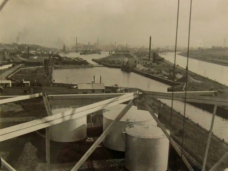 Elevated View of Preston Dock c.1924. The photo was yaken from one of the electricity pylons then being constructed adjacent to the Bull Nose. 
The image does serve to illustrate just what a smoky place Preston once was. The town appears to be shrouded in a thick fog.
