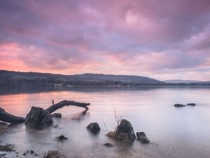 Spending an evening watching the sunset over the glistening waters of the loch feels like a moment straight out of a fairytale. The dazzling palette of oranges, pinks, and purples reflecting off the water makes this Scotland’s most photographed sunset spot. Settle down on the shore around Balmaha with a steaming hot drink in hand from St Mocha Coffee Shop, and let the views amaze you.  