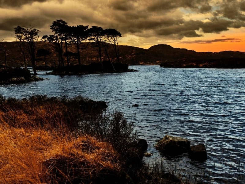 Known for its remarkable rugged landscapes and mountain, Assynt is a remote part of Scotland north of Ullpool on Scotland's stunning west coast. This is a place where you can enjoy a sunset and feel like you are the only person on Earth.