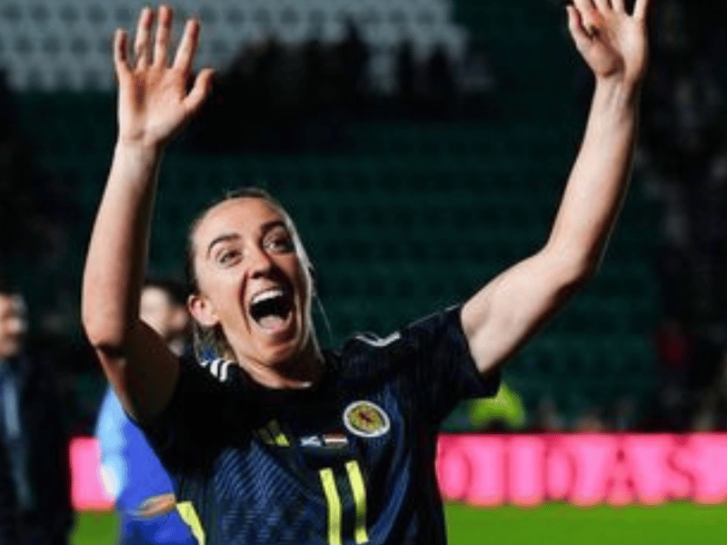 A joyous Lisa Evans enjoys the post-match celebrations after her player of the match performance.