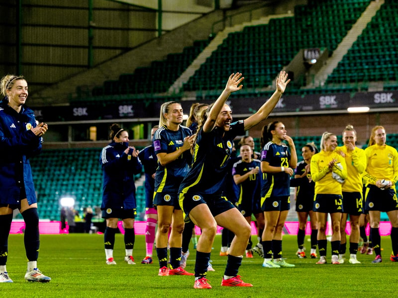 Lisa Evans celebrates with fans a full-time.