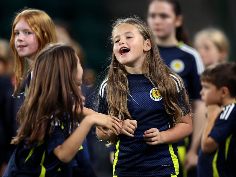 Scotland's mascots enjoy the pre-match atmosphere.