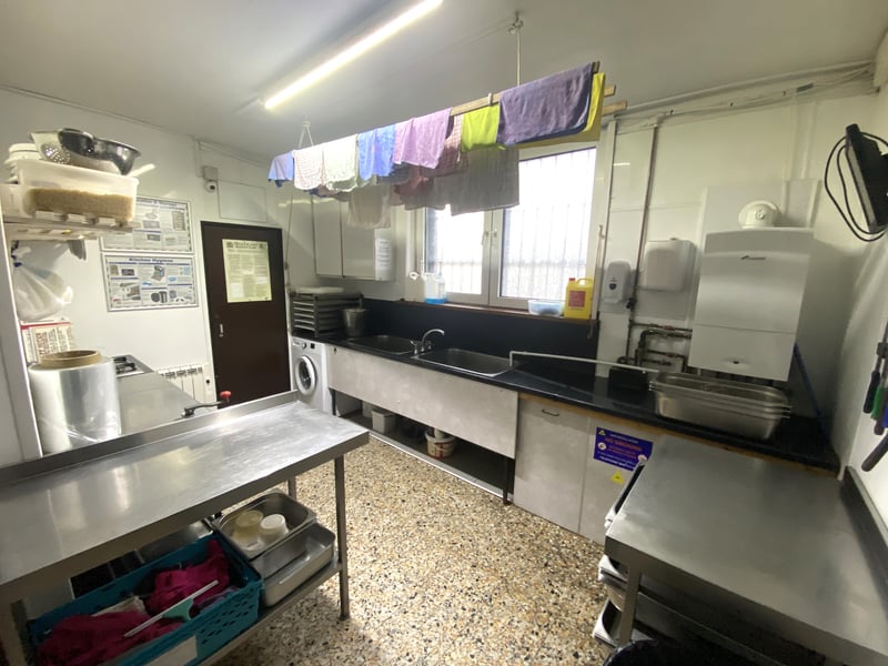 The kitchen is modern and clean.
