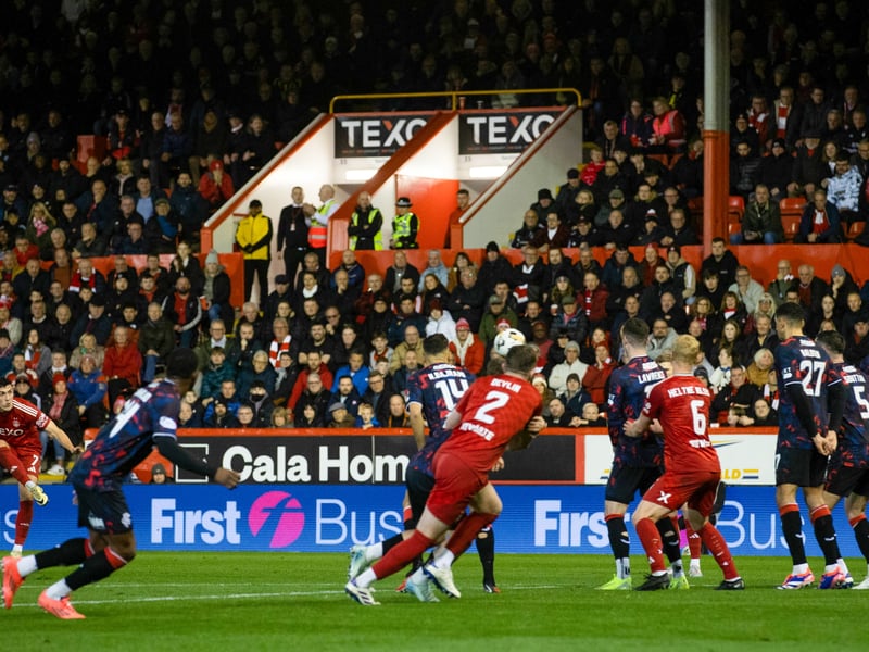 Fans watch on as Jamie McGrath pings a free-kick inches wide of Jack Butland's goal.