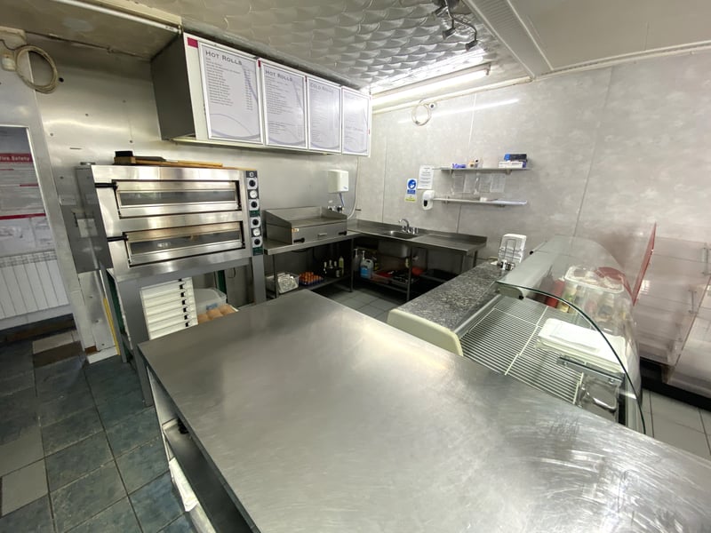There are two prep areas alongside the kitchen.