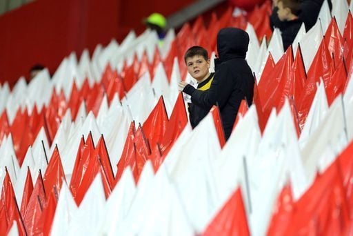 Young Aberdeen fans amongst the red and white flags before kick-off.