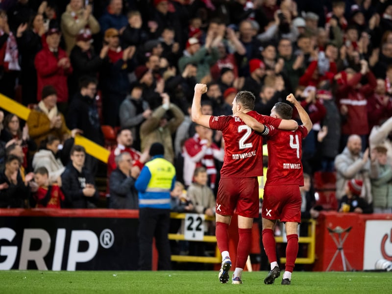 Aberdeen goal scorer Nicky Devlin celebrates with man of the match Graeme Shinnie at full-time.