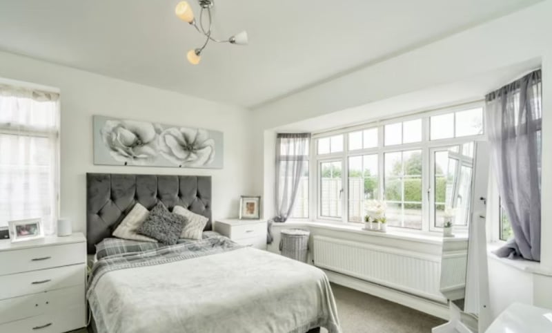 The listing says: "A superbly presented 4 bedroom detached bungalow having been extensively improved by the present owner situated in this popular residential road less than 500m from the beach." 
