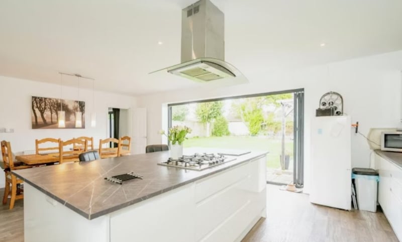 This fantastic home is a stone's throw from the beach. 