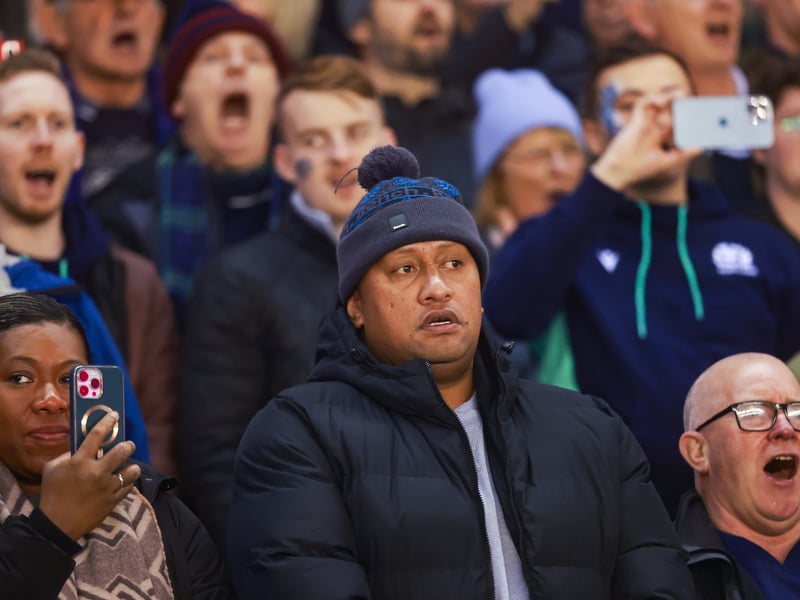 A few fans get their phones out