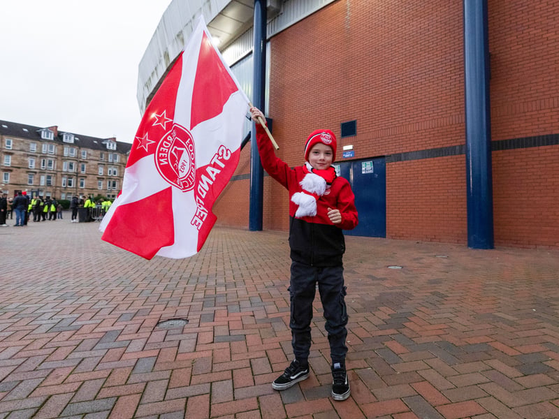 A young Aberdeen fan shows off his colours at Hampden Park.