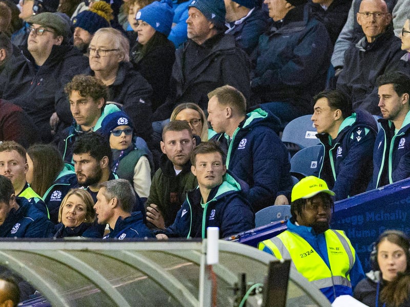 Scotland's Finn Russell watches on from the subs bench.
