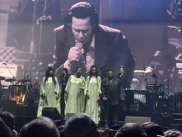 A quartet of gospel singers made the songs soar.