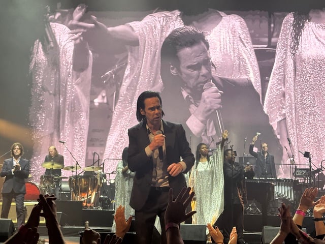 Cave was in good form, borrowing scarves from audience members to wipe sweat from his face and getting the crowd involved at every opportunity.
