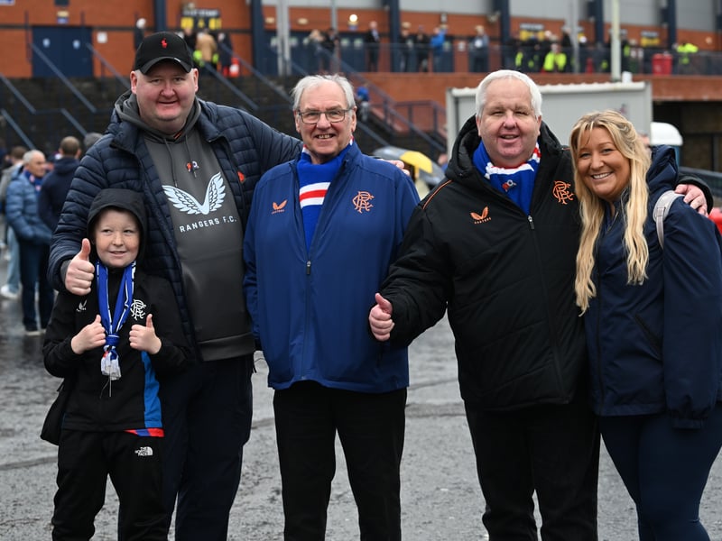A family of Rangers supporters arrive at Hampden for the Premier Sports Cup semi-final.