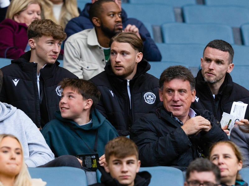 Motherwell trio Jay Gillies, Callum Slattery and Paul McGinn watch on during the Premier Sports Cup semi-final.