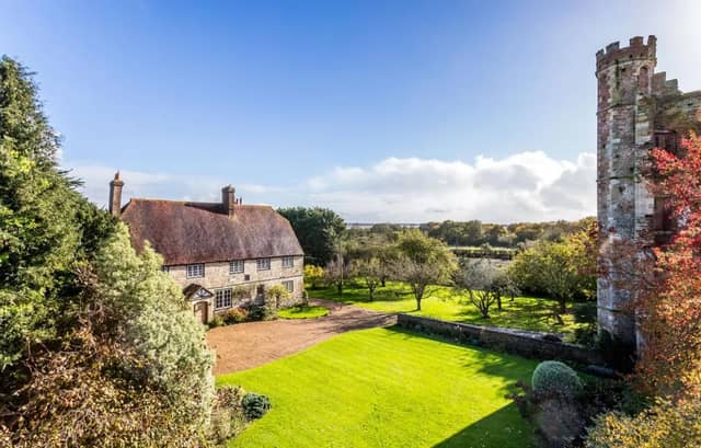This home comes with seven bedrooms, four bathrooms and four reception rooms.