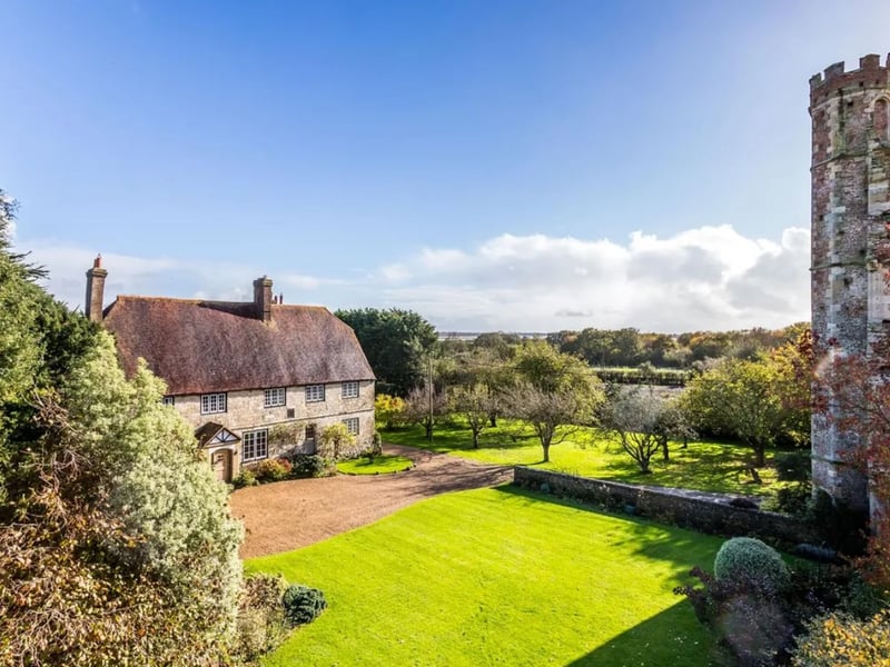 This home comes with seven bedrooms, four bathrooms and four reception rooms.
