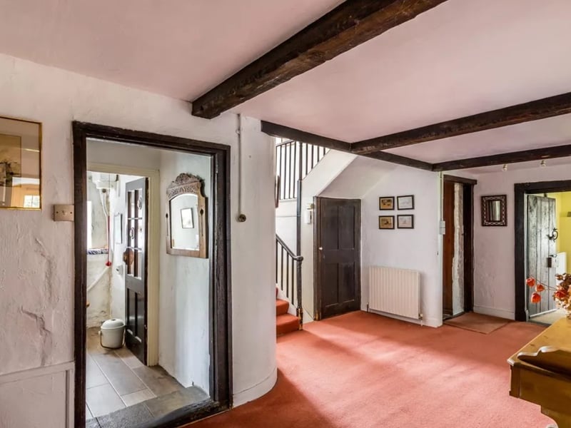 The listing says: "In the parish of Warblington, on Langstone Harbour, a beautiful, Grade II listed, Restoration country house and historic Tower standing in about 4 acres of lovely gardens and grounds including the fascinating moat."