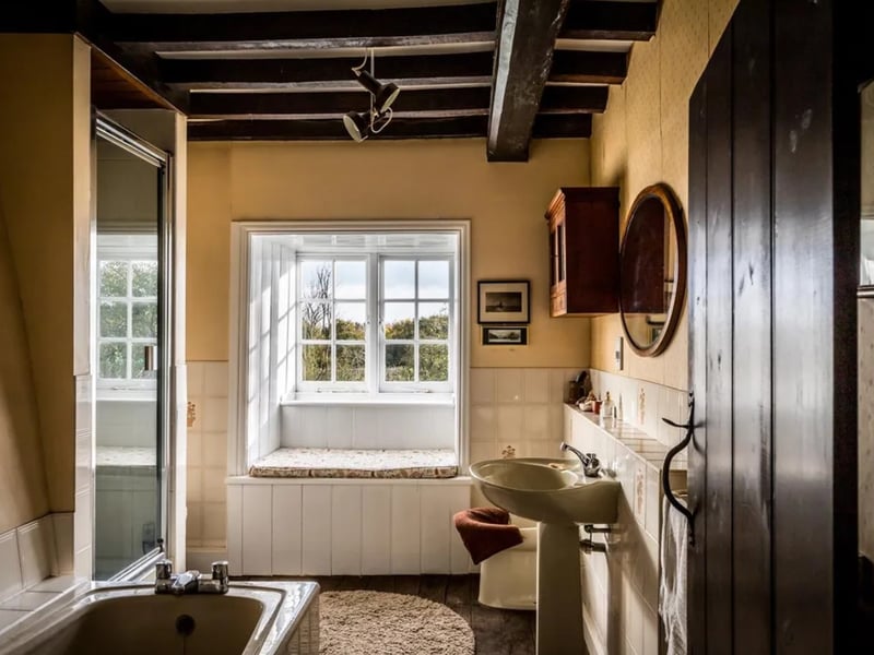 This home comes with seven bedrooms, four bathrooms and four reception rooms as well as a historic Tower standing in about 4 acres of lovely gardens.