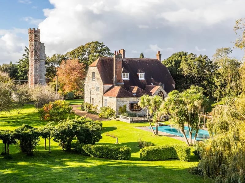The listing says: "In the parish of Warblington, on Langstone Harbour, a beautiful, Grade II listed, Restoration country house and historic Tower standing in about 4 acres of lovely gardens and grounds including the fascinating moat."