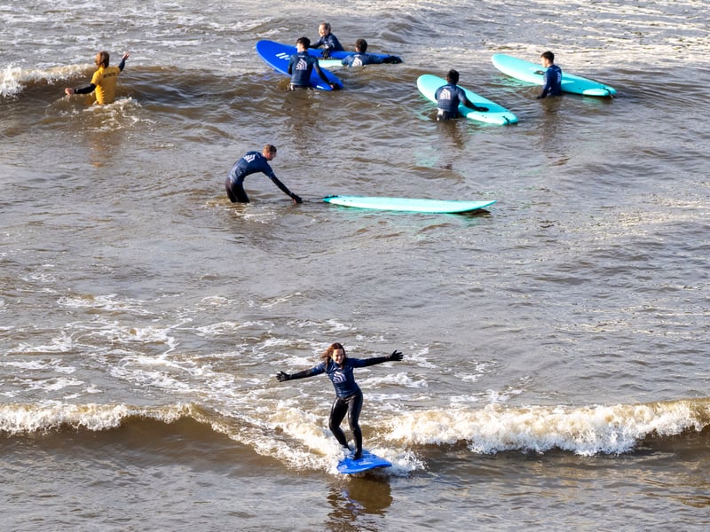 Surfers try out the new wave pool at the launch of the Lost Shore Surf Resort in Newbridge, near Edinburgh. Picture: Jane Barlow/PA Wire