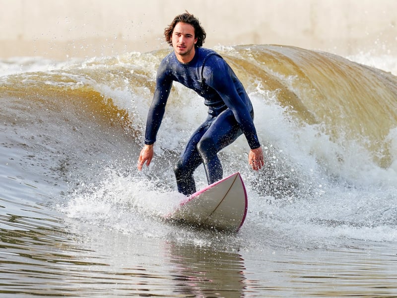 Professional surfer Ben Larg rides the waves at the launch of the Lost Shore Surf Resort in Newbridge, near Edinburgh. Picture: Jane Barlow/PA Wire