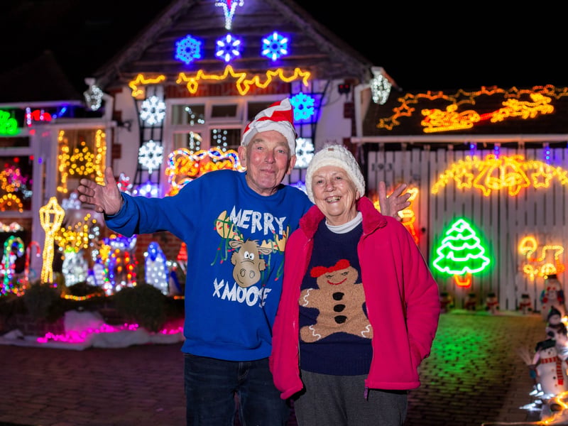 Barbara and Bill Wright have decorated their home with Christmas lights for the past 17 years. 

Pictured: Bill and BarbaraWright outside their home in Portchester

Picture: Habibur Rahman