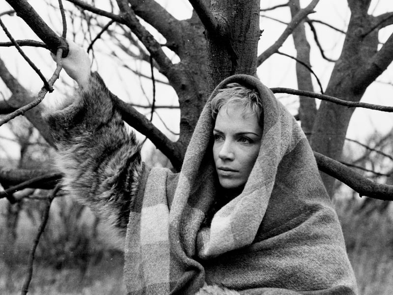 Annie Lennox needs little introduction as the singer of 1980s powerhouse pop band The Eurythmics. Lennox is pictured here in 1983 during the video shoot for Here Comes The Rain Again, which was filmed in Orkney. Lennox recently recalled the "bone chillingly freezing" conditions of the shoot, during which she wore a night dress and no shoes. PIC: Getty.