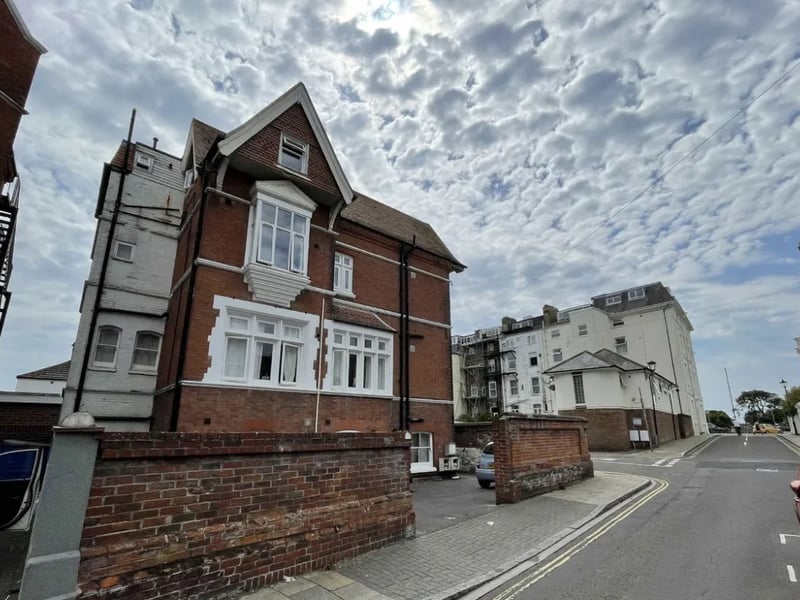 The listing says: "We invite immediate offers (strictly on Auction terms) for this exceptionally well-situated and lucrative investment opportunity, being a very substantial, virtually detached character residence arranged as 5 apartments."