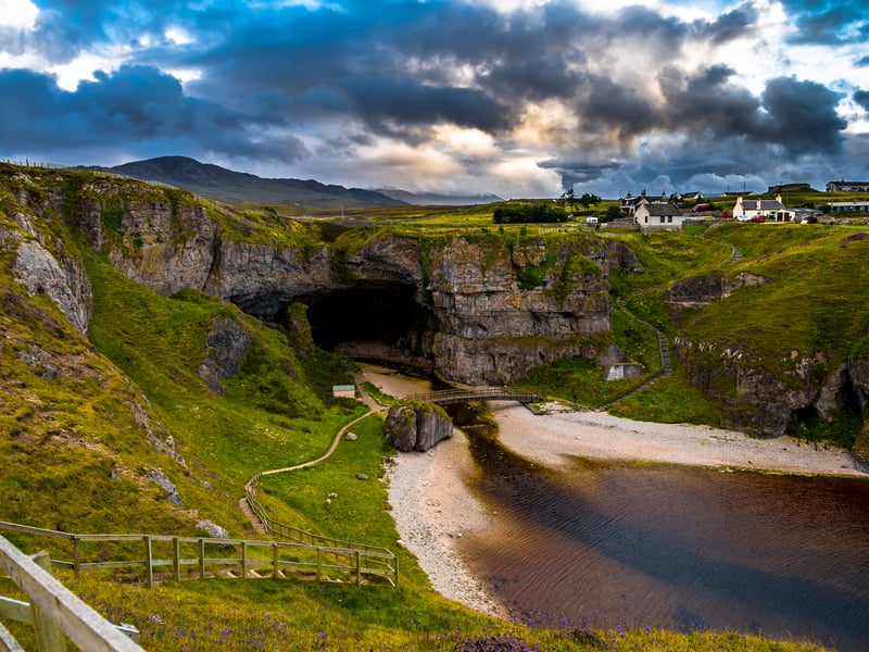 For those traversing the North Coast 500, Smoo Cave is a dramatic sea cave set within Sutherland's limestone cliffs.
