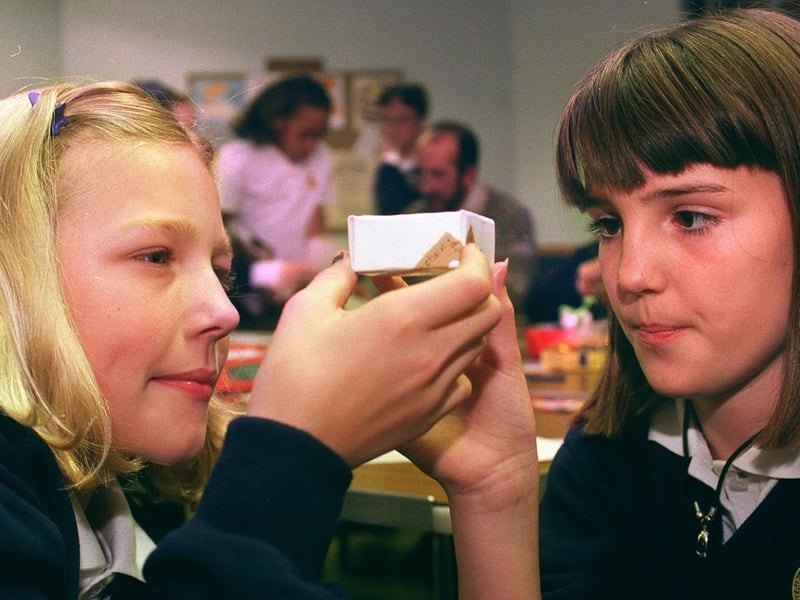 Members of the 1st Chapeltown Girls' Brigade making Christmas boxes to sell for charity at Chapeltown Methodist Church in 1999. Kirsty Spaven, 12, left, and Heather Renshaw, 11, are seen checking their handiwork. 