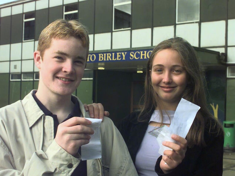 Birley School pupils Paul Muir, 16, who got 8 A star grades, 3 As and 1 B in his GCSEs, and Victoria Burdon Bailey, also 16, who got 3 A stars, 8 As and 1 B, pictured outside the school in 1999