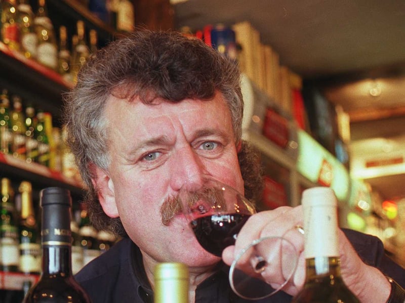 John Mitchell, of Mitchell's wine merchants, in Meadowhead, Sheffield, gets in the festive spirit with these wines in 1999