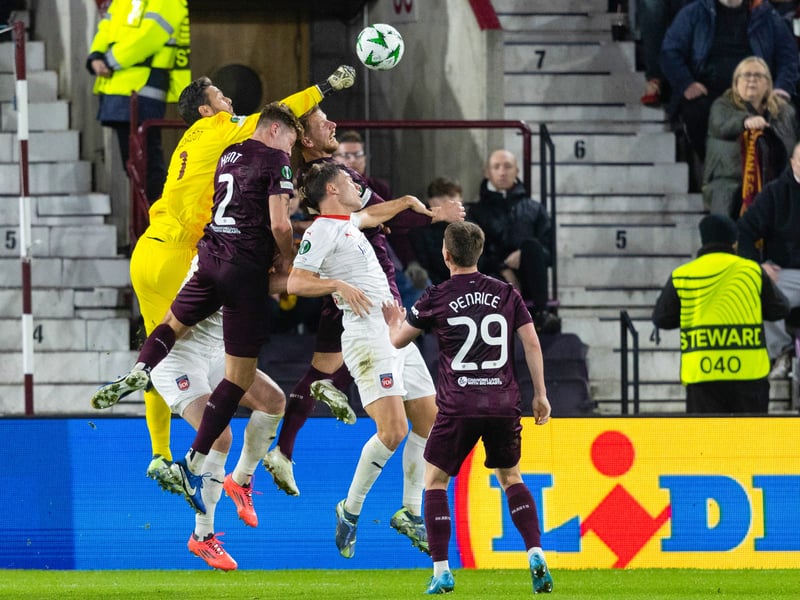 The veteran Hearts keeper was largely redundant for much of the first half, his only act of note coming to punch a cross that was headed back towards goal by Lennard Maloney. Little chance with the goals. 6