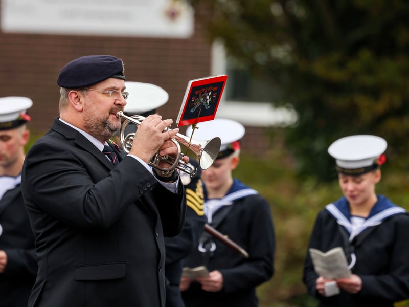 Mark Rooke plays the Last Post at the Drumhead Ceremony at HMS Sultan