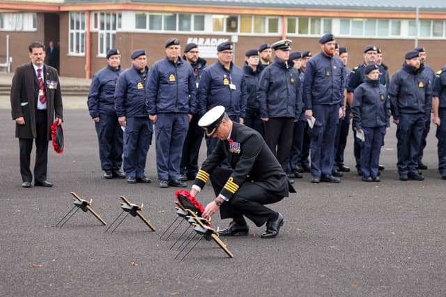 The commanding officer of HMS Sultan, captain Mark Hamilton lays a wreath at the Drumhead Ceremony.