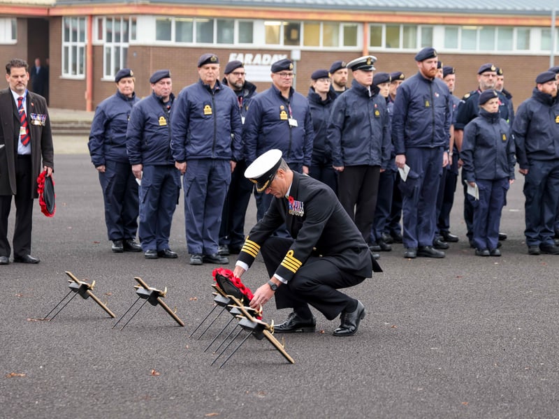 The commanding officer of HMS Sultan, captain Mark Hamilton lays a wreath at the Drumhead Ceremony.