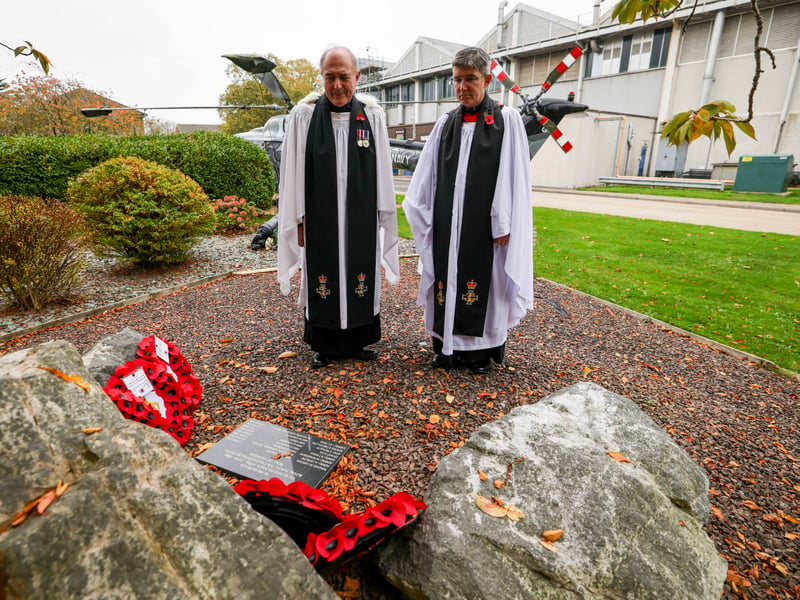 Royal Navy Chaplains James Percival and David Simpson lay wreaths at the Falklands Memorial in HMS Sultan.