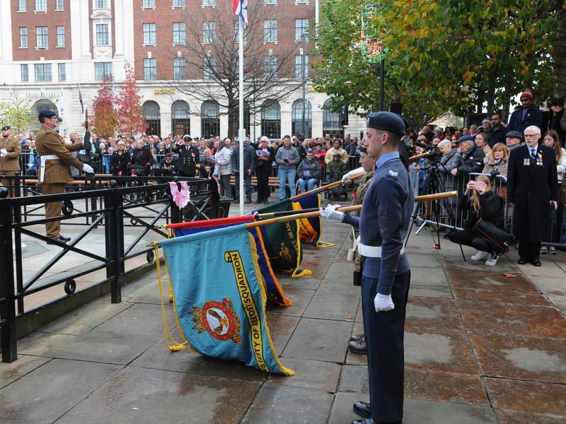 Flags are lowered as the ceremony begins
